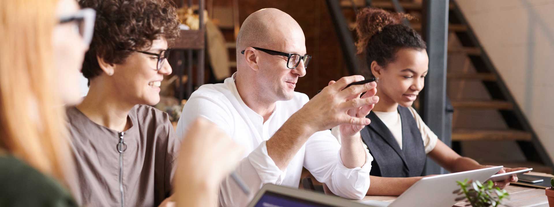 tech startup team member gather